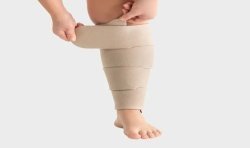 Dispositif de compression pour mollet Juzo Compression Wrap - Pose
